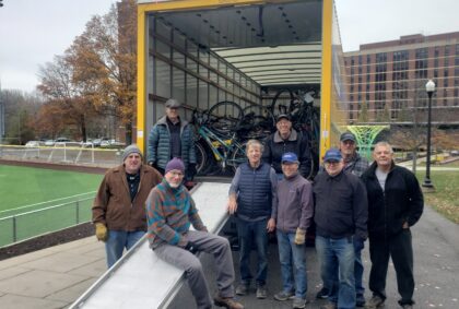 picture of R community bike volunteers accepting donated bikes.