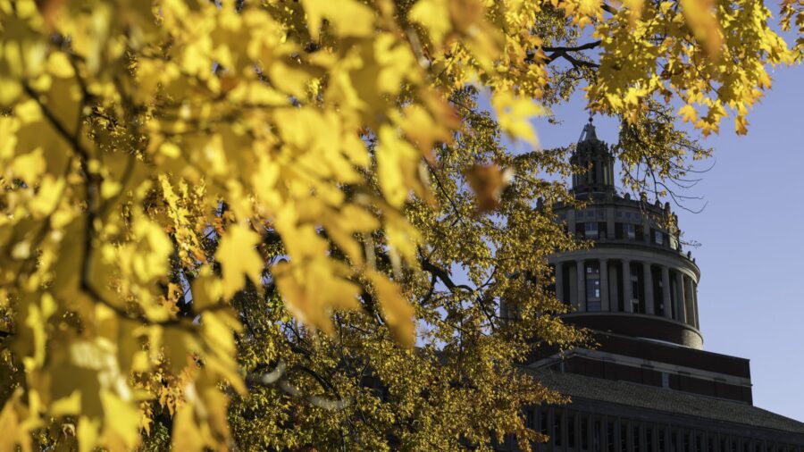 Rush Rhees Library is seen through colored tree leaves change as Fall approaches October 24, 2022. // photo by J. Adam Fenster / University of Rochester